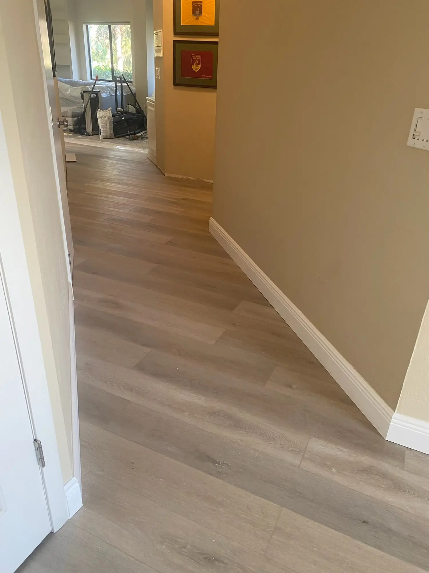 Carpet and tile out, one floor in