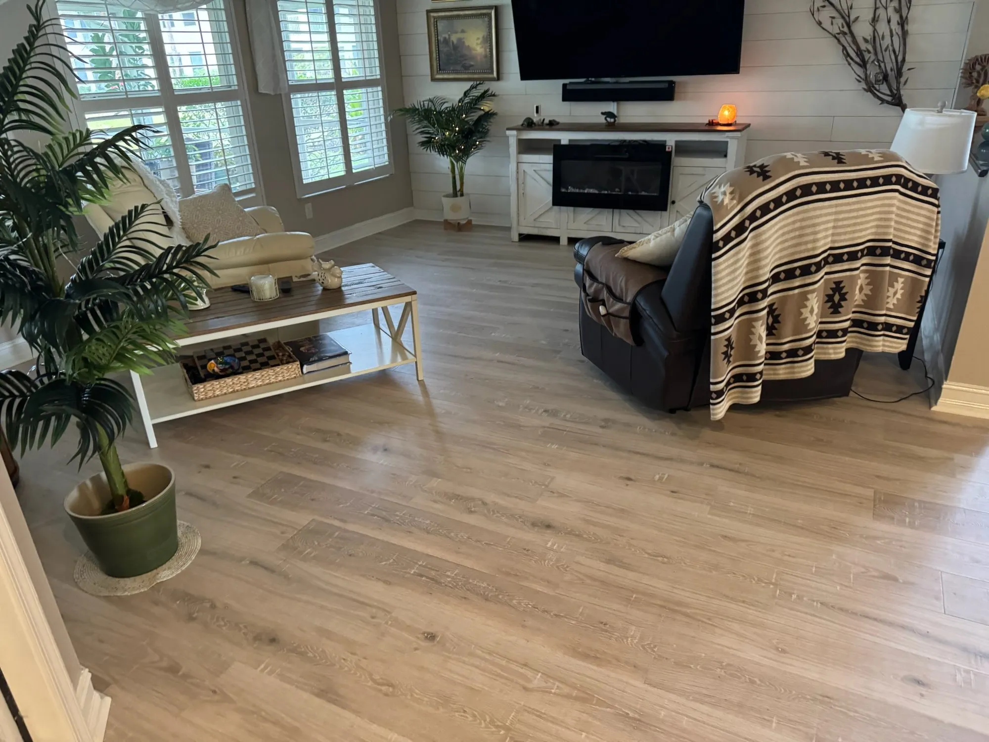 Light oak plank through an open floor plan