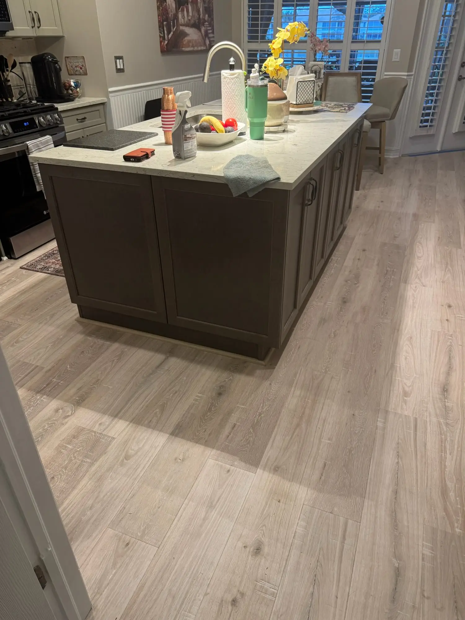 Light oak plank through an open floor plan