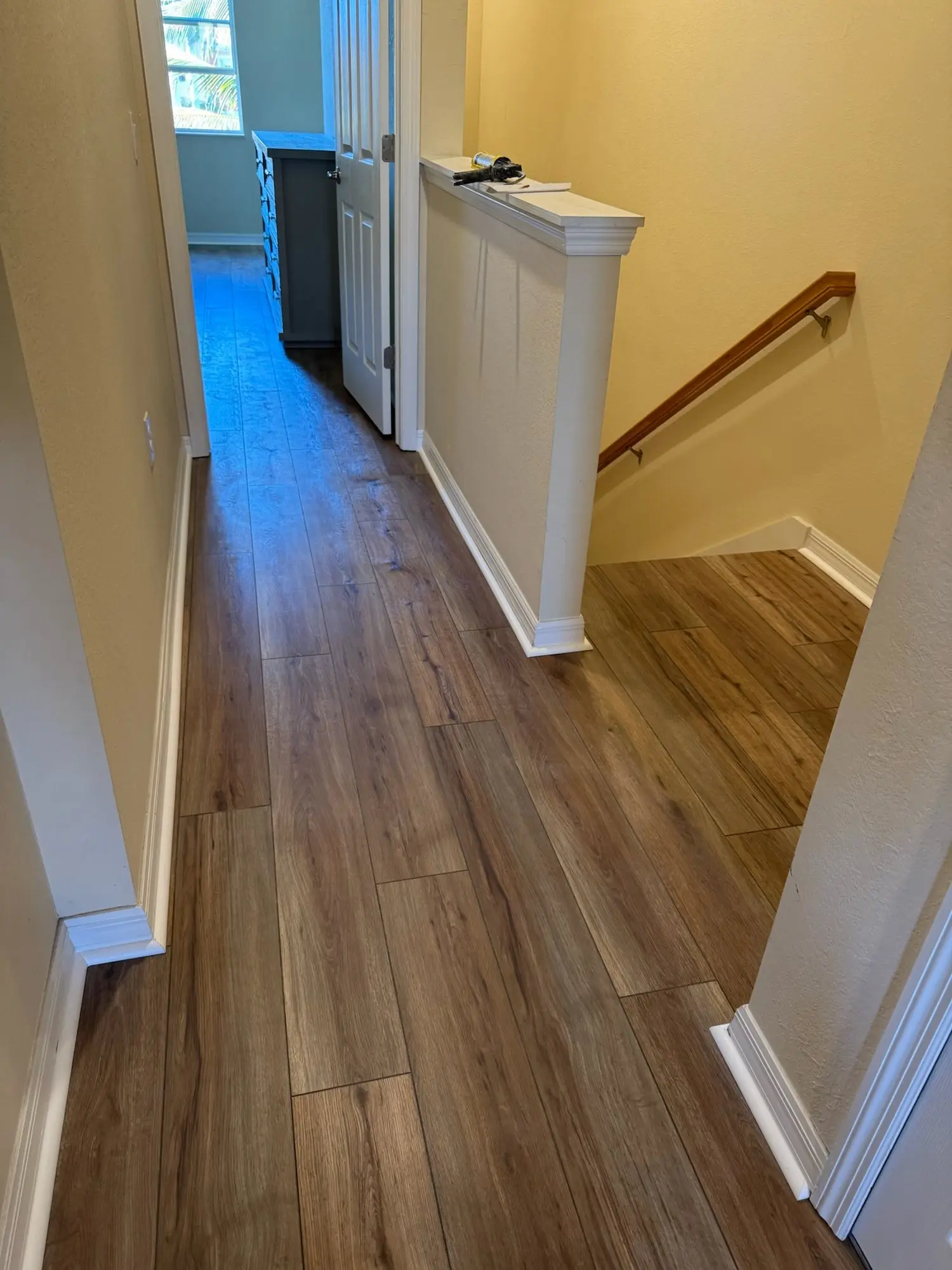 Warm brown plank across the second floor
