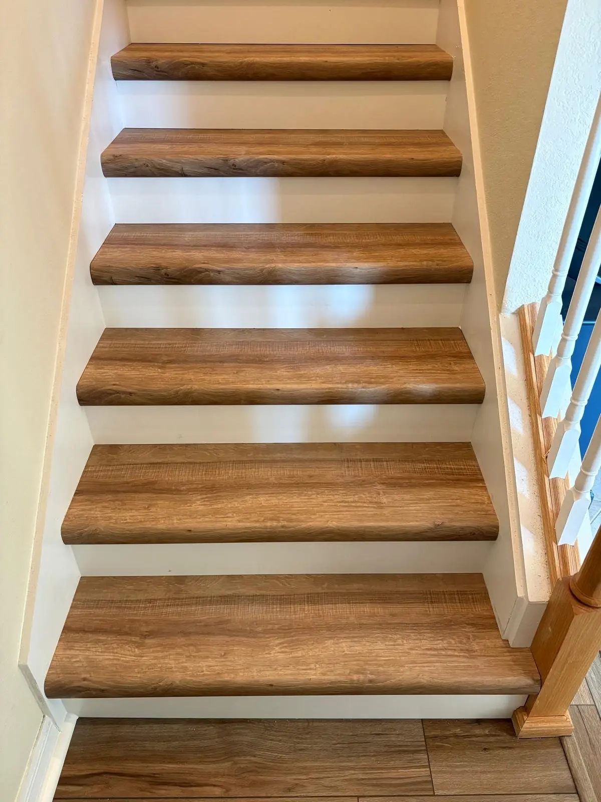 Warm oak treads with white risers